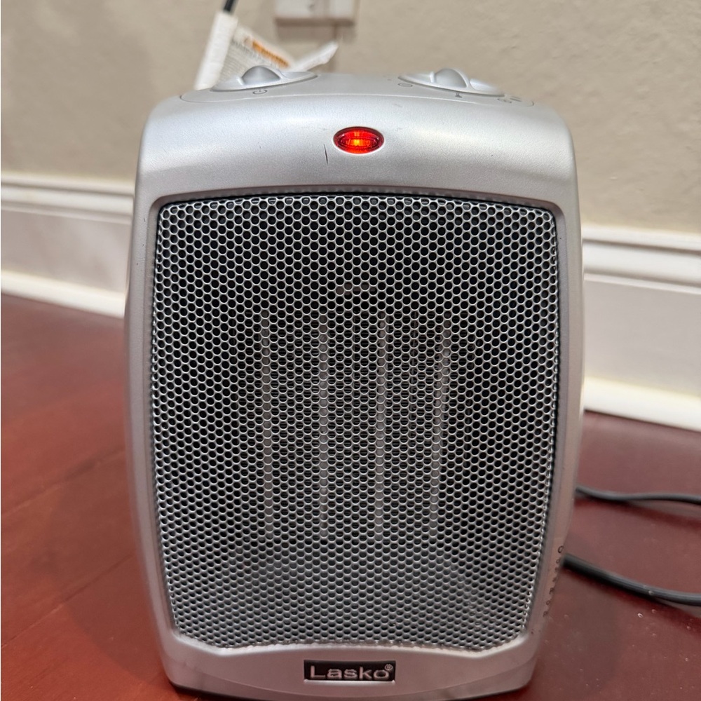 Lasko 9" 1500W Electric Ceramic Space Heater with Adjustable Thermostat, Silver